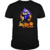 Baltimore Ravens mascot standing with flag shirt