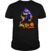 Baltimore Ravens mascot standing with flag shirt