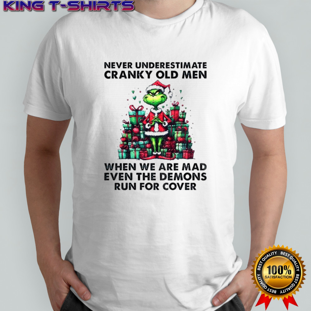 Grinch Santa hat never underestimate cranky old men when we are mad even the demons run for cover Christmas shirt