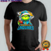 Grinch wearing Santa x Jacksonville Jaguars hat Christmas shirt